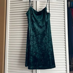 Emerald green velvet dress
